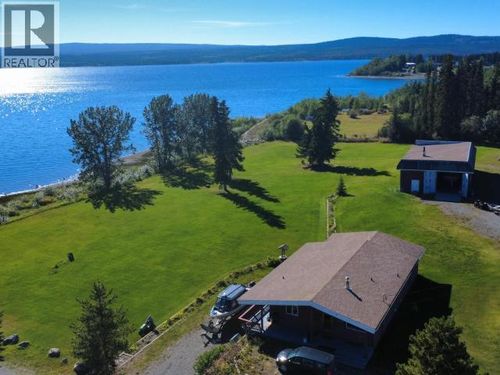 6 Nisutlin Dr, House with 4 bedrooms, 3 bathrooms and null parking in Teslin YT | Card Image