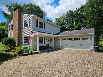 Front of property with a garage | Image 1