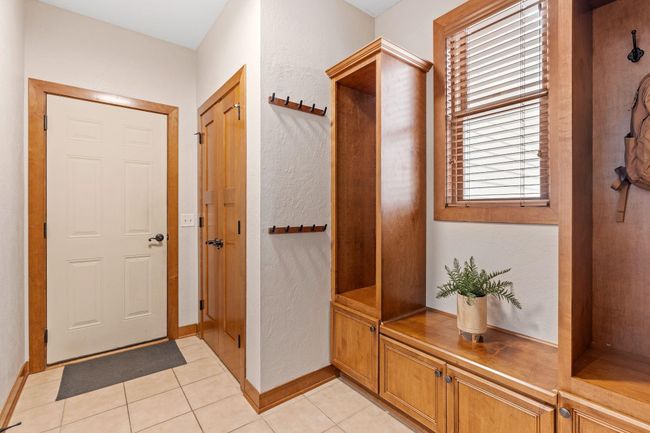 Large mudroom with tons of storage, perfect for those muddy spring days. | Image 20