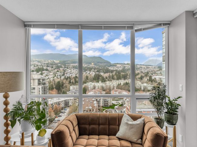 Sunroom / solarium with a view of city and a mountain view | Image 4