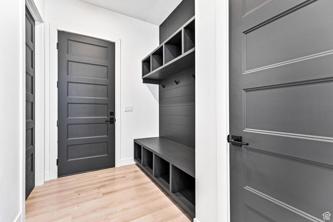 Mudroom featuring baseboards and light wood-type flooring | Image 28