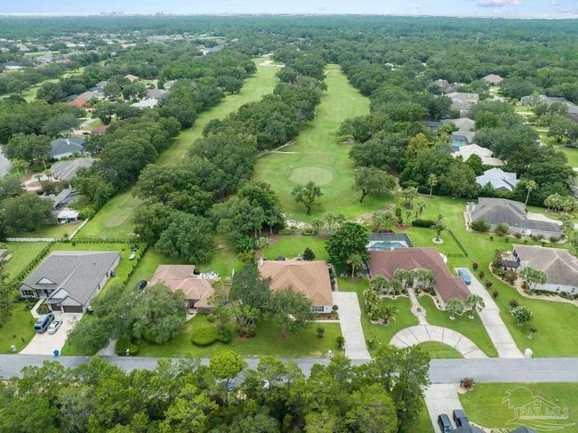 7008 Turnberry Cir, House other with 4 bedrooms, 2 bathrooms and 3 parking in Navarre FL | Image 69