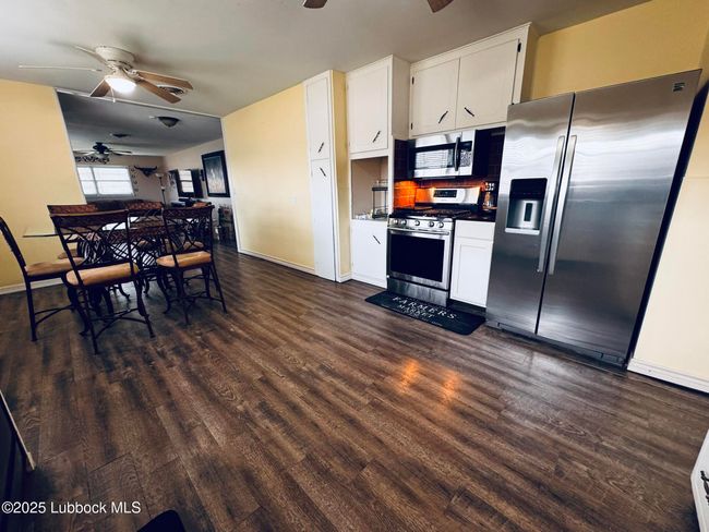 Open flow from kitchen, dining, living... | Image 9