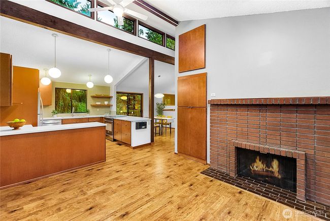 Open-concept kitchen and den | Image 16