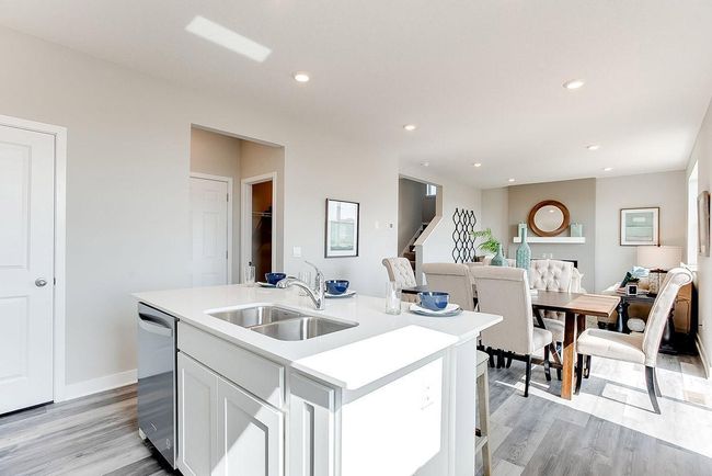White cabinets make this kitchen bright, clean and crisp. Photo of model home, color & options will vary. | Image 5