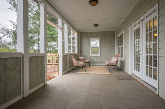 Back Patio is Screened + has Storm Shelter Access in the Floorboard to go BELOW GRADE! | Image 5