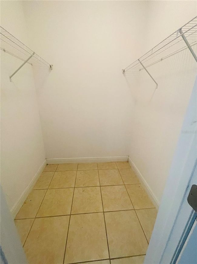 1589 Cumin Dr, Home with 2 bedrooms, 2 bathrooms and null parking in POINCIANA FL | Image 18