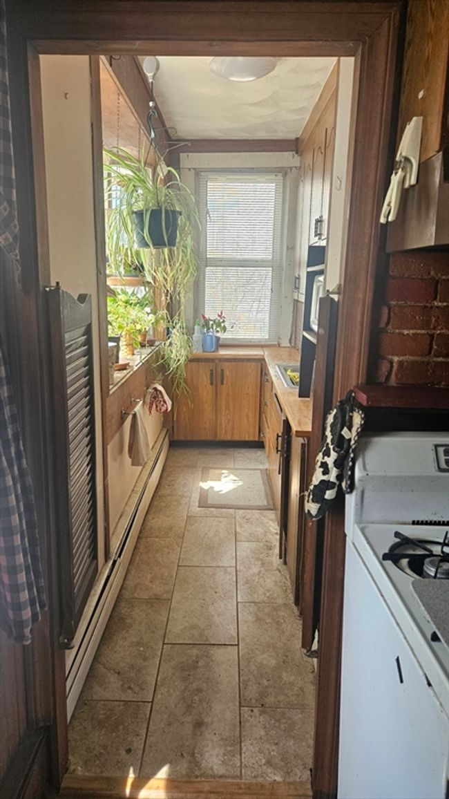 715 Elm St, Home with 4 bedrooms, 3 bathrooms and 4 parking in Woonsocket RI | Image 9