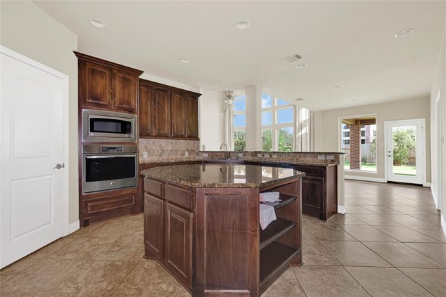 13617 Fountain Mist Dr, House other with 5 bedrooms, 5 bathrooms and 3 parking in Pearland TX | Image 18