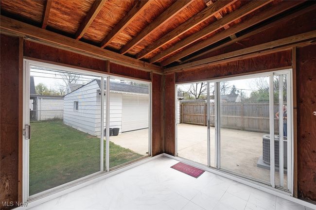View of unfurnished sunroom | Image 31
