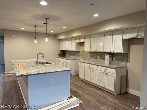 115 W Main St, Brighton, MI, 48116-1521 | Card Image