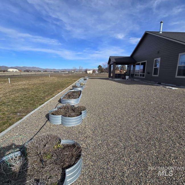 View of yard with a patio area | Image 21