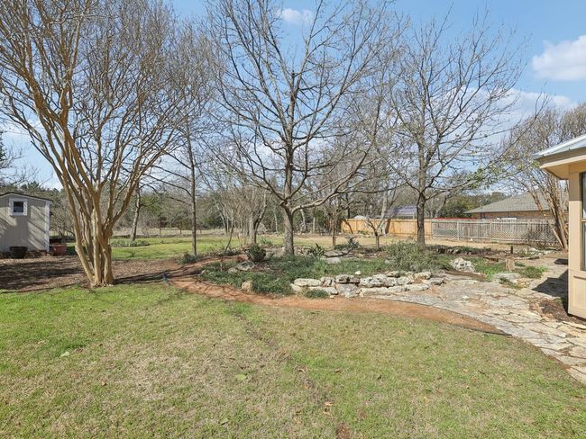 View of yard featuring fence | Image 38