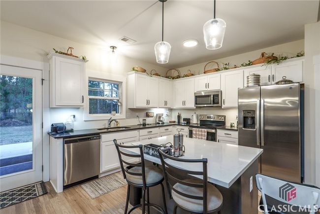 5761 W Dixie Hwy, House other with 4 bedrooms, 3 bathrooms and 4 parking in Rutledge GA | Image 13