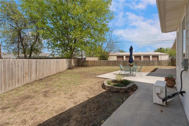 View of yard with a patio and a fenced backyard | Image 43