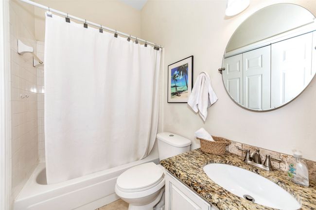 Full bathroom featuring vanity, shower / bath combo, and toilet | Image 17