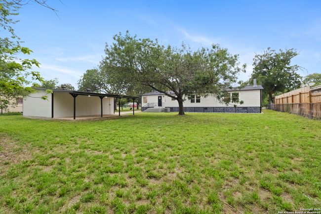 15024 Mesquite St, House other with 3 bedrooms, 2 bathrooms and null parking in Lytle TX | Image 20