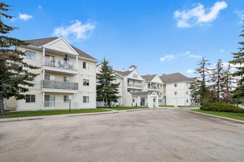 307-309 Woodside Drive Nw, Airdrie, AB, T4B2E7 | Card Image