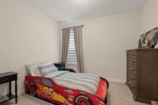 Another secondary bedroom with luxury carpet. | Image 23