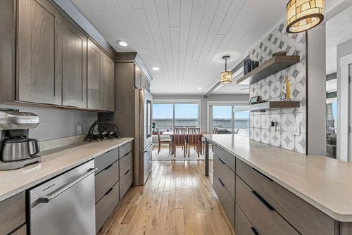 5648 Mackenzie Dr, Kewadin, MI, 49648-9096 | Card Image