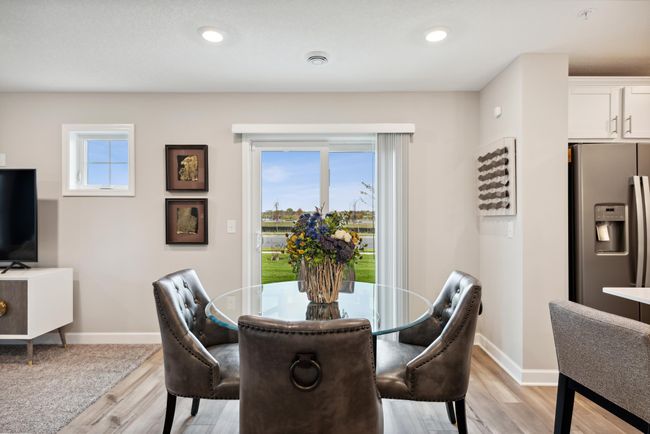 Tons of natural light in this open concept floorplan! *Please note, photos are of a model and are not the actual home. | Image 5