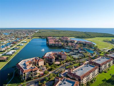 Magnificent Sunrise await you from this lakeside top floor retreat | Image 1