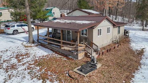 4712 Poplar Dr, Harrison, MI, 48625-8607 | Card Image