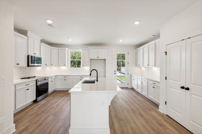 The BEST kitchen you will find in a townhome anywhere! Does your current kitchen have this much storage and preparation space? If not, it's time to upgrade! Actual photo of home. | Image 10