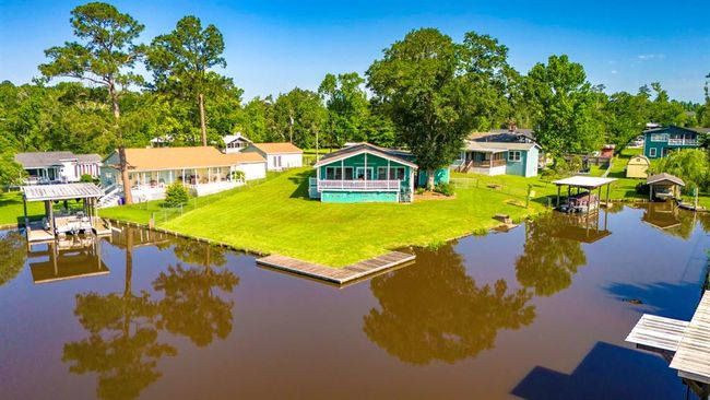 Lake house with large yard. | Image 5