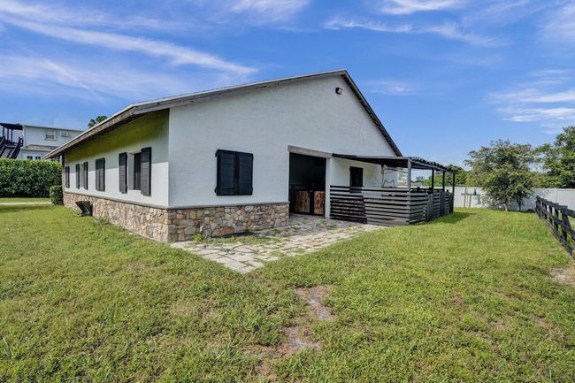 502 Rambling Drive Cir, House other with 5 bedrooms, 3 bathrooms and null parking in Wellington FL | Image 82