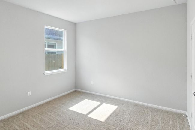 Unfurnished room with light carpet and baseboards | Image 18