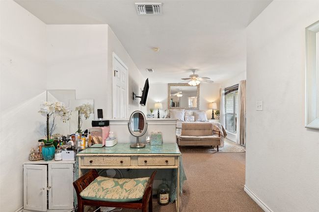 View of carpeted bedroom | Image 25