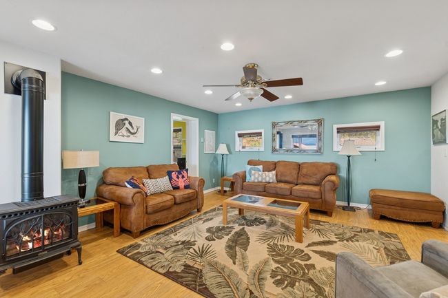 Living area with gas stove | Image 10