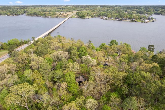 Bird's eye view with a water view and a wooded view | Image 8