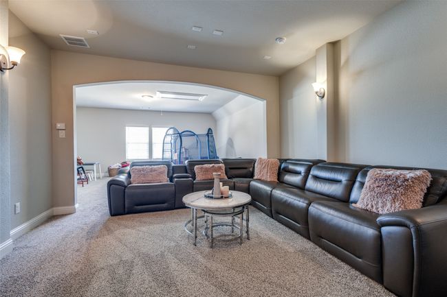 View of carpeted living room | Image 29