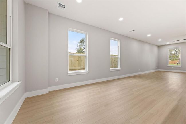 Dining area with a view. Enjoy mealswith your loved ones in this spaciousdining area, easily accessible fromthe kitchen for seamlessentertaining. | Image 5