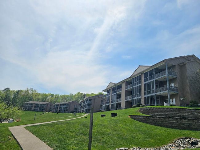 Lake side of building | Image 7