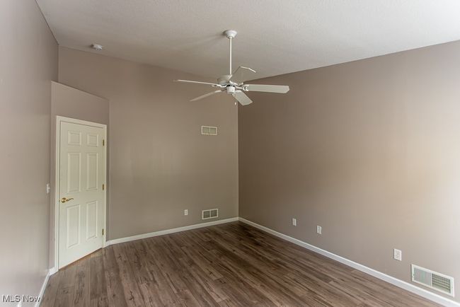 Unfurnished room with wood finished floors and ceiling fan | Image 31