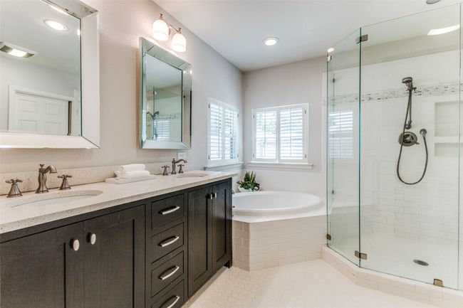Full bath with a separate shower, a garden tub, double vanity, and recessed lighting | Image 18
