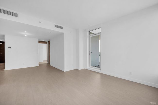 Empty room with wood finished floors and baseboards | Image 13