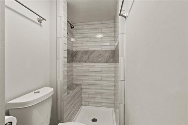 Full bath with a tile shower and toilet | Image 22