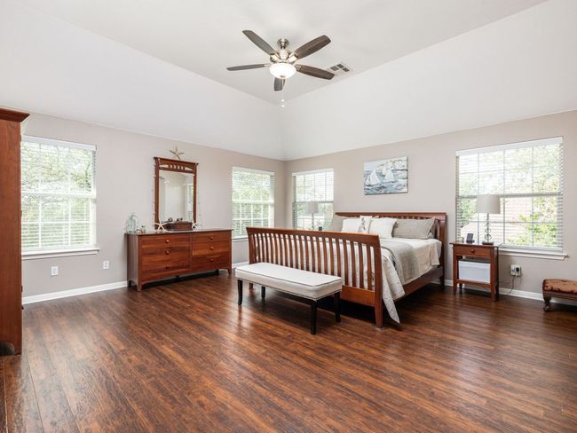 Spacious primary bedroom, owner retreat featuring renovated bathroom and sitting room | Image 12