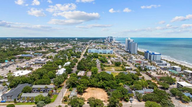 View of urban area featuring a nearby body of water | Image 6