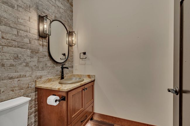 Half Bath off the garage entry. | Image 76