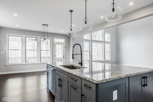 There is space for a large table in the breakfast nook. | Image 18