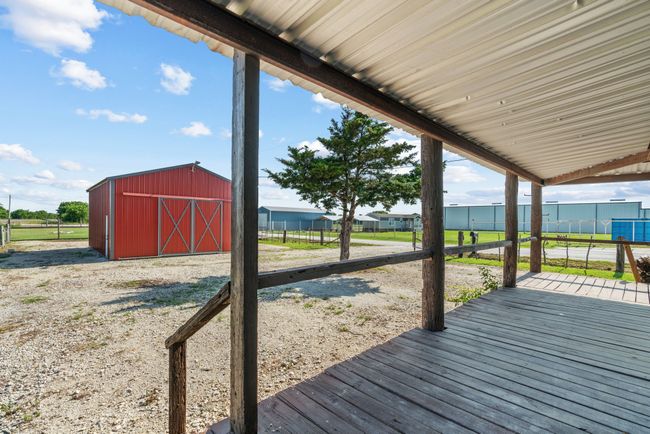 Deck with an outbuilding and a barn | Image 8