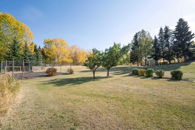 28 Poplar Hill Place, Home with 4 bedrooms, 3 bathrooms and 6 parking in Rural Rocky View County AB | Image 41