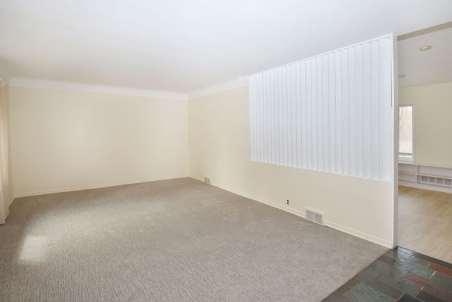 newer carpet in living room | Image 6