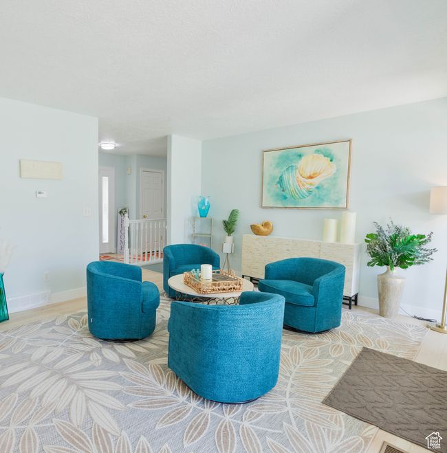 Living area featuring baseboards | Image 28