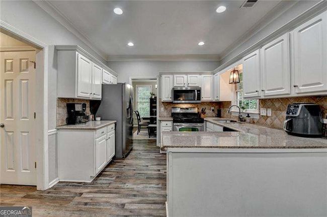 5574 Wynhall Dr, House other with 4 bedrooms, 3 bathrooms and null parking in Peachtree Corners GA | Image 15